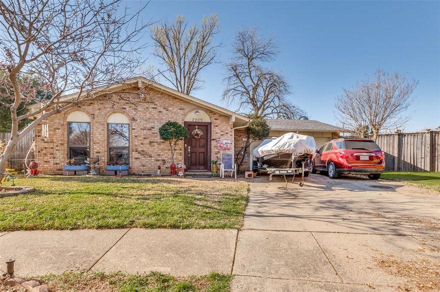 Nestled on a quiet cul-de-sac in the established Green Meadows neighborhood, this beautifully updated single-story home sits on an expansive 0.41-acre lot, offering rare outdoor space and privacy in the heart of Irving. The property features 3 bedrooms, 2 bathrooms, and approximately 1,533 square feet of thoughtfully designed living space with an open floor plan ideal for both everyday living and entertaining.
Inside, the spacious family room features cathedral ceilings, Tile flooring, and a Custom fireplace, creating a warm and inviting centerpiece for the home. The updated kitchen is equipped with solid surface countertops, abundant cabinetry, a breakfast area, providing both style and functionality. The home also includes modern interior updates such as refreshed bathrooms, updated doors, Conveniently located near schools, shopping, and major commuter routes, this home combines classic Texas charm, generous lot size, and modern updates—a rare opportunity in one of Irving’s established neighborhoods.