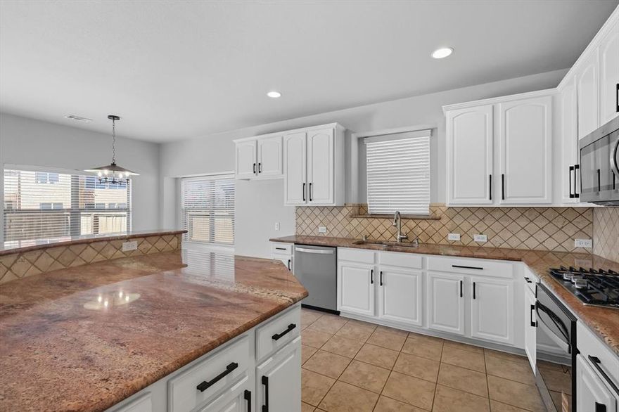 Move-in ready and beautifully refreshed, this light-filled 4-bedroom home impresses with thoughtful updates throughout. Fresh paint and brand-new 2025 carpet create a crisp, welcoming atmosphere. The chef’s kitchen is a standout, featuring granite countertops, a tumbled marble backsplash, and 2025 appliances—perfect for everyday cooking or entertaining. The open layout flows effortlessly into the spacious family areas, while a private office with hand scraped hardwood floors offers the ideal work-from-home retreat. The primary suite offers comfort and style with fresh carpet and plenty of natural light. Upstairs, you’ll find a spacious game room, three secondary bedrooms, and a full bath. Additional highlights include a custom wine closet, laundry room with built-in cabinetry, and a convenient mud area. Lantana residents enjoy award-winning amenities, including
walking trails, community pools, pickleball and tennis courts, and top-rated schools. 850 Branch Crossing blends style, function, and comfort and is ready for you to move right in and enjoy. Schedule a private showing today!