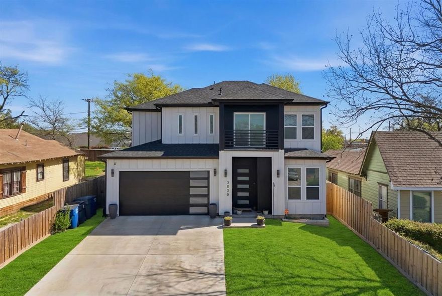 Welcome to this stunning modern 2023 new-construction masterpiece just minutes from the heart of Dallas. Thoughtfully designed with elevated finishes and high-end upgrades throughout, this 4-bedroom, 3-bath residence offers the perfect blend of luxury, comfort, and functionality.
Step inside to an expansive open-concept layout filled with natural light, soaring ceilings, and designer lighting that creates an inviting, sophisticated ambiance. The chef-inspired kitchen is the centerpiece of the home, featuring an oversized quartz island, custom cabinetry, sleek hardware, and stainless steel appliances, perfect for entertaining and everyday living. The first floor offers a versatile bedroom or private study with an attached full bath, ideal for guests or multigenerational living. Upstairs, retreat to the oversized primary suite with private balcony access, creating a serene indoor-outdoor escape. The spa-like ensuite bath showcases dual vanities, a soaking tub, a separate glass-enclosed shower, and a spacious walk-in closet designed for convenience and style. You are essentially getting in early, which means strong appreciation as DFW continues to boom as this home is in one of Dallas' many redeveloping neighborhoods. Secondary bedrooms are generously sized and each is enhanced with private balconies, while a centrally located upstairs laundry room with utility sink adds everyday ease. Energy-efficient upgrades such as foam insulation and Low-E windows provide long-term savings and year-round comfort. Step outside to a large, fully sodded backyard with a covered patio—perfect for hosting or relaxing. Additional premium features include a rear-entry parking pad with rolling gate, no rear neighbors for added privacy, and a builder-backed warranty (7 years remaining structural) for peace of mind. This  is a rare opportunity to own a move-in-ready property with modern luxury upgrades, functional design, and close proximity to downtown, dining, and major highways.