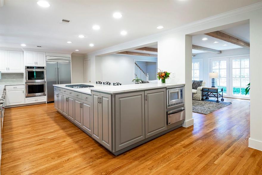 Circular drive up to a charming 5bedroom,5 bath home in Janmar.Kitchen area(updated new2021) 2 dishwashers,3 sinks,2ovens, side by side refrigerator,microwave  abundance of cabinets,Quartzite countertops butler's area coffee bar.Opens to breakfast room and den with high wood beam ceiling. Banquet size dining room.Large living room vaulted wood beam ceiling walk-in wet bar, FP.Library with floor to ceiling bookcases,FP. MASTER SUITE DOWN with Gas FP connecting study. Upstairs,4 bedrooms 3 baths game room,office and a huge craft closet. Wood, brick,carpet flooring recently painted.Large covered patio next to pool,gas BBQ lush landscaping. Pier and beam foundation 3car garage.