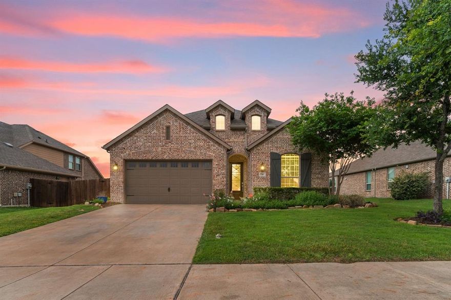 Built by Highland Homes and thoughtfully designed for modern living, 346 Windsor offers the kind of single-story layout buyers are always hoping to find in North Grove. With 4 bedrooms, 3 full baths, a private study, and an open-concept design, this home combines comfort, style, and functionality in one of Waxahachie’s most desirable neighborhoods. From the moment you step inside, the impressive scale of the home stands out with tall ceilings, 8 foot doors, and oversized windows that invite in natural light and create a bright, airy feel throughout the main living spaces. The open kitchen is positioned at the heart of the home, flowing seamlessly into the spacious family room to create an ideal setting for everyday living, entertaining guests, or simply enjoying time together. Whether you love to cook, host, or just appreciate a home that feels connected and easy to live in, this layout delivers. The private study near the front of the home offers flexibility for a home office, reading room, playroom, or quiet retreat. In the primary suite, a beautiful bay window adds charm and dimension while creating the perfect spot for a sitting area or peaceful morning light. The secondary bedrooms are well placed for privacy and convenience, making this floor plan a strong fit for a variety of living needs. Step outside to the covered patio, where there is plenty of room to grill, relax, or create an outdoor living space that fits your lifestyle. Located in highly sought after North Grove, this home also offers access to the neighborhood amenities and the convenience of being close to local schools, shopping, dining, and all that Waxahachie continues to offer. If you have been looking for a move-in ready home with timeless finishes, a smart one-story layout, and the quality craftsmanship Highland Homes is known for, 346 Windsor deserves a spot at the top of your list.