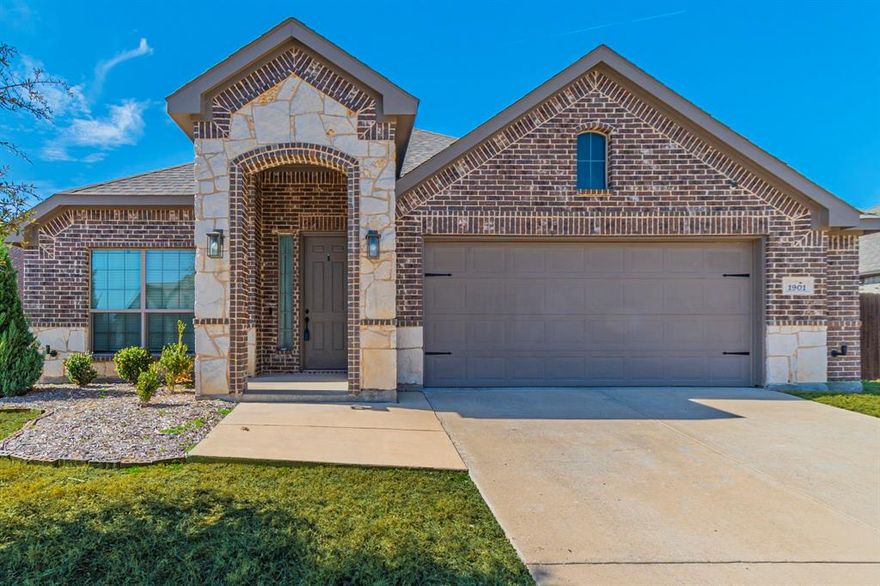 BEAUTIFUL AND MOVE IN READY! GORGEOUS STONE AND BRICK ELEVATION! Nice covered patio. 3 bed, 2 bath, 2 car garage. Open floor plan. Classic dark WOOD FLOORS THROUGHOUT with ceramic tile in the wet areas. No carpet. WELCOME TO YOUR NEW CHEF'S KITCHEN! GRANITE island with breakfast bar. SS appliances. Plenty of cabinet space. Bright and open interior with plenty of natural light and neutral color scheme. Crown Moulding!  STUDY with french doors and 2 DINING AREAS! Large living area with cozy see through fireplace from living area to breakfast. Expansive primary bedroom boasts WIC, double sinks, SEPARATE SHOWER AND GARDEN TUB! Mosaic tile inset. Well landscaped. Full Sprinkler. Premier location with easy access to shopping and freeways and restaurants.