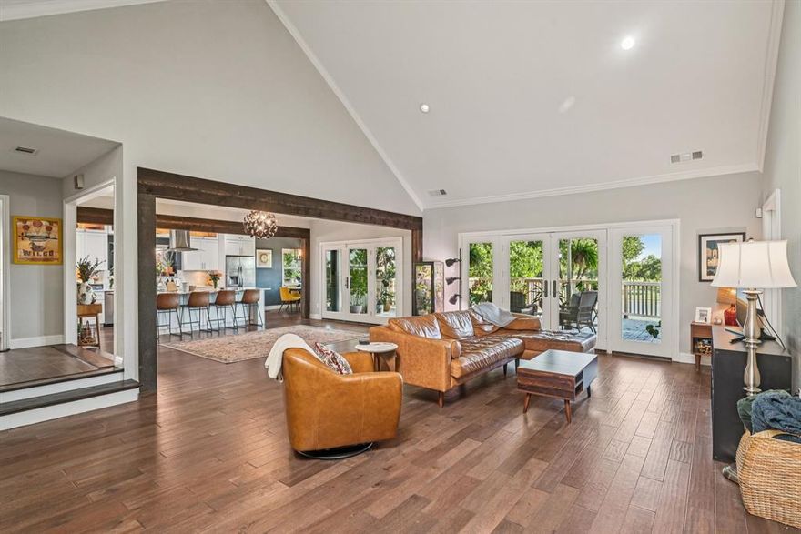 Discover one of the best opportunities to own a golf-course home in Dallas at 4027 Fairlakes Dr, ideally positioned on the 5th tee box of the prestigious Dallas Athletic Club. This beautifully updated residence offers more than 3,000 square feet of thoughtfully designed living space with sweeping fairway and pond views that create a peaceful, resort-style setting right in your backyard. A wall of windows across the main living area fills the home with natural light and showcases the stunning golf course scenery, making it perfect for both everyday living and entertaining guests. The open-concept layout provides a seamless flow between the living room, dining area, and kitchen, creating an inviting atmosphere for gatherings and comfortable daily living. The spacious primary suite serves as a true retreat with custom built-ins, two generous walk-in closets, and a beautifully updated spa-inspired bathroom designed for relaxation and comfort. Two additional bedrooms and a well-appointed full bath offer flexibility for family, guests, or a home office, while the additional half bath adds convenience for entertaining. Step outside to an expansive wood deck that stretches across the back of the home—an ideal space for outdoor dining, morning coffee, or relaxing evenings overlooking the manicured fairways of the Dallas Athletic Club golf course. The outdoor living area provides a front-row seat to breathtaking sunsets and serene golf course views that are rarely available at this price point in Dallas. Located in a well-established community near White Rock Lake, major highways, shopping, and dining, this home offers the perfect balance of privacy, scenery, and accessibility. With true golf-course frontage, over 3,000 square feet of living space, and a highly desirable Dallas Athletic Club location, 4027 Fairlakes Dr represents one of the most compelling values currently available for golf-course living in Dallas.