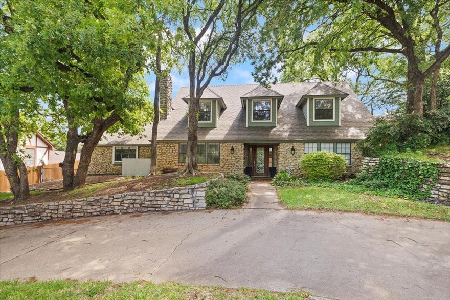 Welcome to one of North Arlington's most sought-after streets — and homes on Wilson Drive don't come up often. Nestled beneath a stunning canopy of mature trees, this beautifully updated 3,481 sq ft showpiece delivers the space, style, and location that buyers spend years searching for.
Inside, gleaming hardwood floors and classic crown molding set a polished tone from the moment you walk in. The chef's kitchen is the heart of the home — shaker cabinets, marble backsplash, granite countertops, stainless steel appliances, and a large center island that's made for gathering.
Four generous bedrooms and four full bath, offering privacy. The first-floor suite features a roll-in shower — a rare and thoughtful touch ideal for multigenerational living. A dedicated media room, pre-wired for surround sound and LED lighting, rounds out the interior with a true wow factor.
The backyard is something special. A massive patio with a built-in fire pit and seating sets the scene for year-round entertaining, while an organic garden and custom kids' play space make this outdoor retreat as functional as it is impressive.
 At $540,000, this is exceptional value for everything Wilson Drive delivers — schedule your private showing today before someone else does.