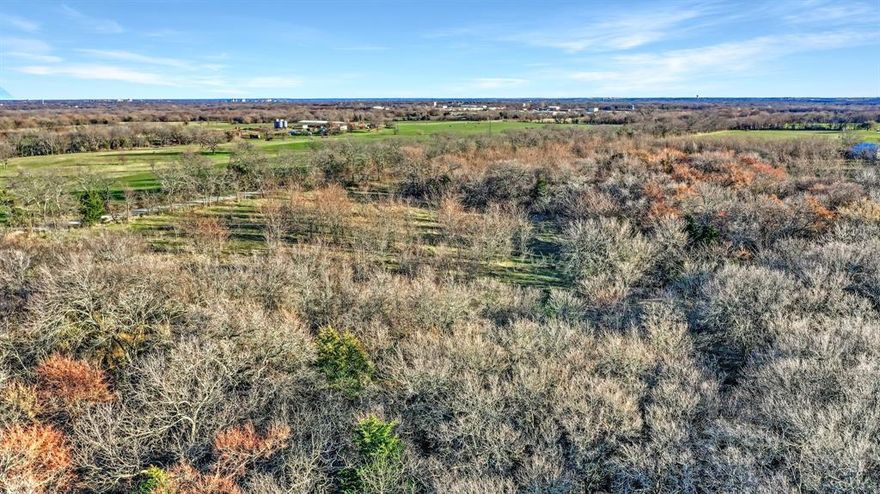 Excellent investment opportunity in rapidly growing Grayson County, TX! 87+ Acres on Reynolds Lane is located near major intersection of Hwy 289 and Hwy 82, North Texas Regional Airport and in the Sherman ETJ.  12-inch City of Sherman water line located along Hwy 82.    Recent major announcements by Texas Instruments for $30B expansion for semiconductor wafer plant plus Taiwan-based GlobalWafers new state-of-the-art 300-millimeter silicon wafer factory in Sherman.  Property includes several ponds, mature trees and wildlife.  Approximately 935 feet of road frontage on Reynolds Lane.  Property located in avigation easement: density restrictions apply.  This property is within future thoroughfare plans for City of Sherman. Ag exempt and survey available.