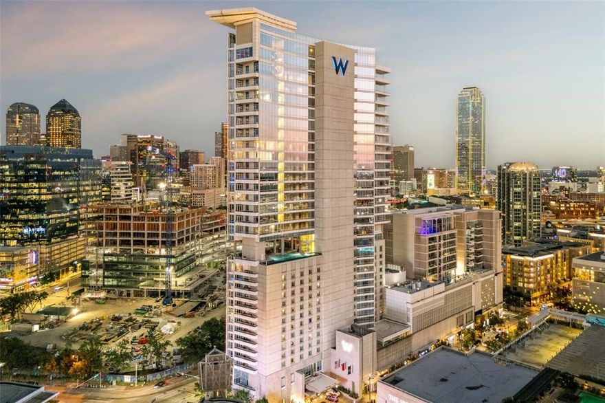 Experience the pinnacle of urban sophistication in this newly unveiled penthouse, an architectural showpiece that blends modern artistry with five-star resort living. Perfectly positioned above the vibrant city and steps from the American Airlines Center, this rare residence offers 3,779 square feet of dramatic interior space, paired with two private terraces, delivering a lifestyle of elegance, prestige, and exclusivity. Designed by VEIRA, the award-winning visionary developer, this 3 bedroom, 3.5 bath masterpiece unfolds across 2 breathtaking levels. At its center lies a soaring Great Hall w-a dramatic living + entertaining space w-25-foot floor-to-ceiling windows framing iconic skyline views. Anchoring the residence is a sculptural modern spiral staircase, a true work of art that seamlessly connects the upper * lower levels. Gourmet chef’s kitchen is an entertainer’s dream, showcasing Italian Calacatta Michelangelo marble, custom cabs, a massive island + a curated suite of Sub-Zero & Viking appliances. Flowing openly into the living spaces, it’s designed for gatherings that are as grand as the views themselves. Primary suite crowns the upper level, offering a serene private escape w-its own terrace, spa-inspired soaking tub + bespoke WIC. Every inch of this home has been meticulously appointed w-oak herringbone floors, hand-selected terrazzo tile, designer lighting, custom millwork, limestone pavers & integrated smart-home technology including a Sonos surround system. As part of the coveted W Dallas Hotel & Residences, homeowners enjoy access to world-class amenities: the renowned Whatever Whenever service, Bliss Spa, a resort-style infinity pool, state-of-the-art fitness, fine dining, lounges + valet. For the ultimate in luxury living, optional daily maid service and private in-home catering are also available.

This extraordinary penthouse redefines city living—a rare fusion of luxury, artistry, and lifestyle—set high above the Dallas skyline.