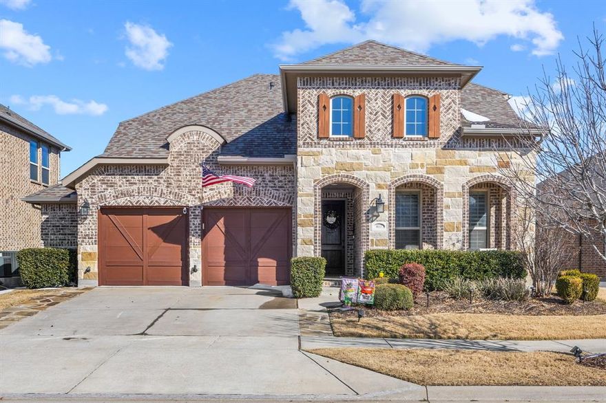 Step into a lifestyle that blends luxury, comfort, and convenience in the highly sought-after Union Park community. This stunning two-story home is a true masterpiece, offering everything you’ve been dreaming of and more. From the moment you arrive, you’ll be captivated by the gorgeous landscaping and resort-style amenities that make Union Park one of the most desirable places to live.

Inside, rich wood floors and an open-concept layout create an inviting atmosphere perfect for both everyday living and entertaining. The gourmet kitchen, featuring stainless steel appliances, an oversized island, and a stylish backsplash, will make cooking a joy. Imagine hosting friends and family in the custom dining room with its built-in wine rack and glass-front hutch, or enjoying the peace and privacy of the main-level owner's suite, complete with a soaking tub and walk-in closet.

Designed with multi-generational living in mind, this home also features an additional bedroom suite on the first floor, perfect for family members or guests. This second bedroom, along with the master suite, are conveniently located on the main floor, each offering their own full bath. An office or nursery with French doors provides the flexibility to accommodate your unique needs.
Upstairs, the game room and media room offer the perfect space for fun and relaxation, while two additional bedrooms provide flexibility for family or guests.
The backyard is a dream come true, with an extended flagstone patio and a charming wooden pergola offering an ideal setting for outdoor dining, lounging, or entertaining under the stars.
This home offers more than just a place to live; it offers a lifestyle. Don’t miss your chance to experience the perfect blend of luxury, convenience, and community. Homes like this don’t last long, and this one is sure to go fast. Schedule your showing today before it’s gone!