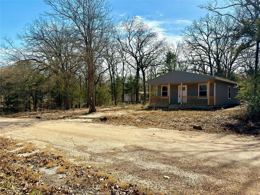Built to Withstand. Designed to Finish Your Way. An opportunity to complete a steel-structured 3 bedroom, 2 bathroom, approximately 1,000 sqft steel-core home in Cherokee Shores near Cedar Creek Lake. Construction began in 2025 using three reinforced shipping containers welded into a unified structure and anchored built on a poured concrete perimeter beam foundation. Designed for durability and efficiency, the home features steel wall and ceiling structure with spray foam insulation throughout. Covered front porch in place. Interior framing, some roughed in electrical and plumbing. Situated on a 100x100 lot with no floodplain. City water and sewer available to connect to. Temporary construction power pole installed. Survey of lots available. POA provides access to a private boat ramp, park, and community pool. Just minutes from the lake & approximately one hour from the DFW metroplex. Potential investor seeking a durable shell with major structural work complete, a builder looking for a distinctive project, or a DIY buyer ready to customize interior finishes and build equity.