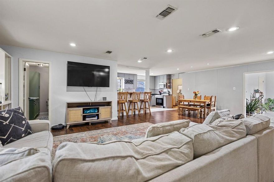 Welcome to this beautifully updated single-story brick home with 4 generously sized bedrooms and 2.5 baths. This home offers ample space for family living or entertaining. Step inside to an open-concept layout that connects the living, dining, and kitchen areas seamlessly. The updated kitchen includes modern cabinetry and a breakfast bar with seating, perfect for casual meals or entertaining. Adjacent to the kitchen is a spacious dining area, creating a functional flow for everyday living. The home offers two and a half baths, including an updated main bath and a stylish half-bath tucked conveniently off the main living area. Bedrooms are well-proportioned and filled with natural light, offering flexibility for a home office, guest rooms, or a growing family. With its blend of updates and potential, this home is a perfect opportunity for buyers looking for space, style, and a chance to personalize. Schedule your showing today!