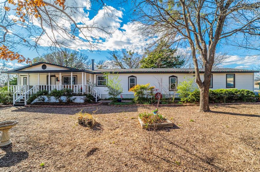 Charming country home set on a spacious, tree-shaded lot offering privacy, functionality, and room to enjoy the outdoors. This inviting property features a welcoming covered front porch, mature trees, a butterfly garden, and thoughtfully designed outdoor spaces that create a peaceful setting.
Inside, the kitchen is the heart of the home, showcasing painted cabinetry, subway tile backsplash, ample counter space, and a large island with seating, perfect for gathering and everyday living. The open layout flows easily into the living and dining areas, enhanced by wood-look flooring and abundant natural light.
The primary bedroom offers generous space and a private en-suite bath featuring a double vanity and oversized walk-in shower. Secondary bedrooms are well sized, and an additional bathroom provides convenience for guests or family.
Outdoors, enjoy a fenced gardening area ideal for growing vegetables or flowers, along with a charming treehouse or chicken coop that adds character and versatility to the property. A dedicated outdoor entertaining space includes a fire pit and seating area, perfect for relaxing evenings. A detached workshop or storage building provides ample space for hobbies, projects, or additional storage.
This property offers the comfort of country living with room to spread out while still providing easy access to the city. A unique opportunity for those seeking space, charm, and a lifestyle connected to nature. Solar panels help reduce monthly energy bills. Recently replaced windows, roof and HVAC.
