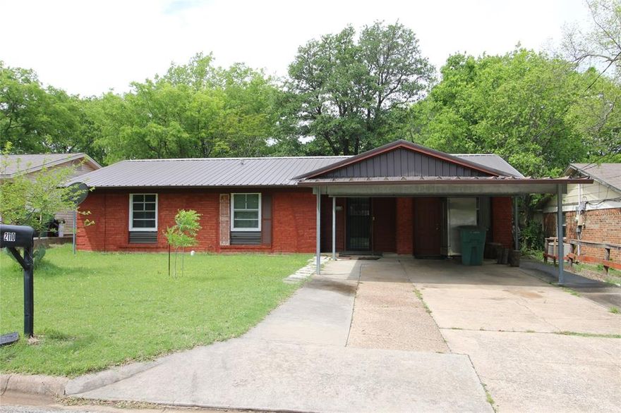 Nice 3 bedroom, 1 and half bathroom plus a big covered patio has a great potential to live with. The original attached garage was converted to a living area that brings additional space to use. The solid slab foundation and beautiful metal roof support low-maintenance ownership. This is the house that could be rarely found around near countryside area. The property is conveniently located with quick access to US-75, making travel to surrounding cities simple while keeping daily essentials, shopping, dining, and outdoor spaces close by. The big covered patio on the back provides you many functions to enjoy with the countryside living style. Whether you're looking for a place to call home or an opportunity to build long-term value, this house offers a solid base in a well-established area of Sherman.