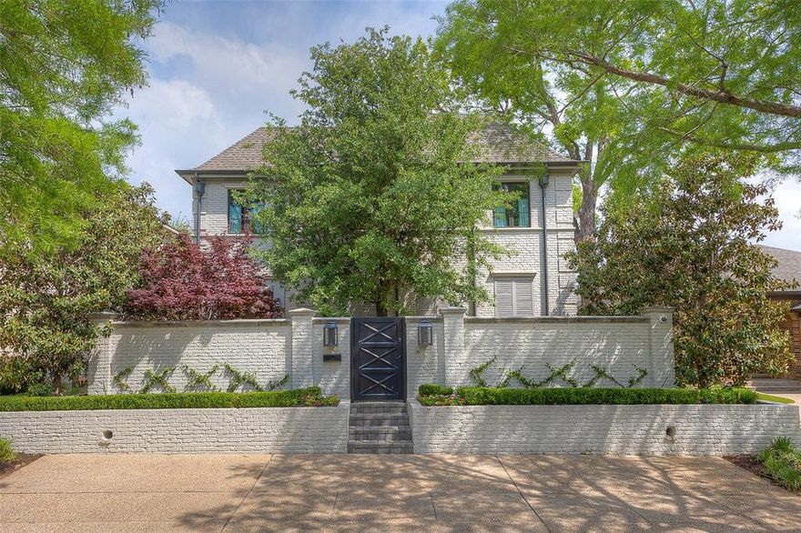 This exquisite beautifully decorated home is the perfect lock and leave with so much to offer.  A huge living area with a floor to ceiling fireplace opens to an outdoor patio and has an additional living area adjacent which boast an open concept.  The gourmet kitchen is equipped with top of the line appliances, designer finishes and a large dining area.  this home has four en suite bedrooms including two masters, one downstairs and one upstairs.  Additional amenities include gated entrance, a front patio with firepit, patio off of living areas, beautiful bar, ample storage, two car rear garage, security system.