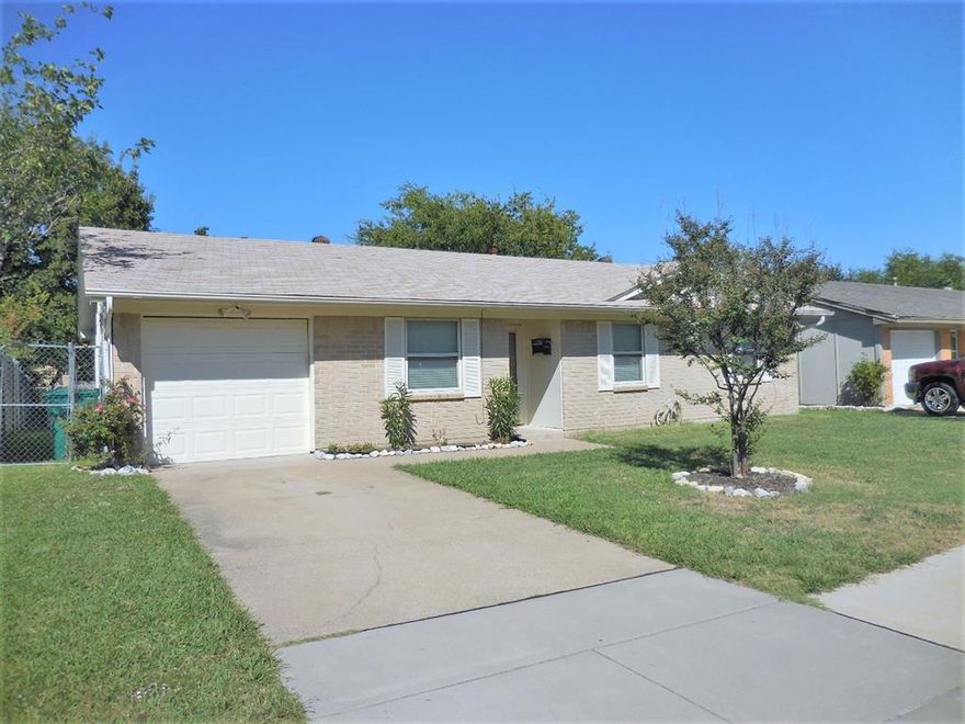 Nice 4 bedroom, 1.5 bath one-story home in Lewisville! Fresh interior paint throughout (May 2025). This home features ceiling fans and neutral colors. Conveniently close to I-35E. Large utility room and a one car garage. Fenced backyard backs up to creek for more privacy. Refrigerator included.