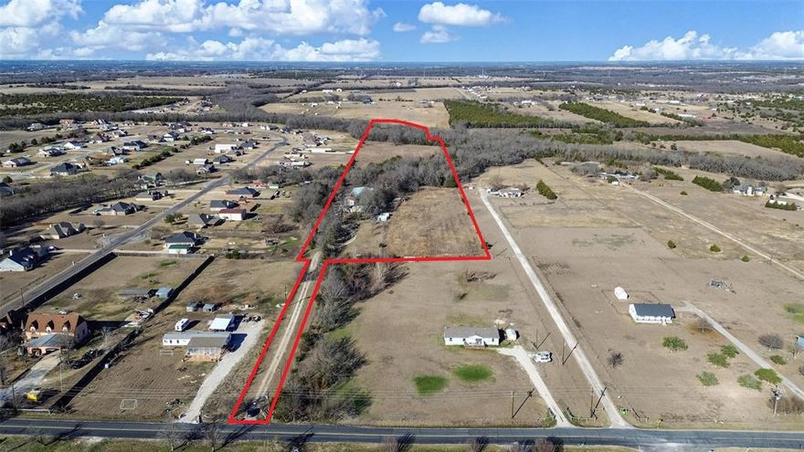 Nearly 15 acres in the heart of Farmersville offering space, privacy, and opportunity. Most of it is already cleared, with scattered mature trees providing natural beauty and flexibility for future use. Whether you’re envisioning a homesite, hobby farm, recreational retreat, or long-term land investment, this acreage gives you room to grow. Property includes a detached garage, a 2-car carport, and multiple open sheds, making it well-suited for equipment, storage, animals, or projects. A 3-bedroom, 2-bath double-wide manufactured home is already in place and conveys as-is. Located just minutes from downtown Farmersville and with easy access to Highway 78, this property delivers a rare combination of usable acreage, existing improvements, and location at an excellent price point in a rapidly growing area.