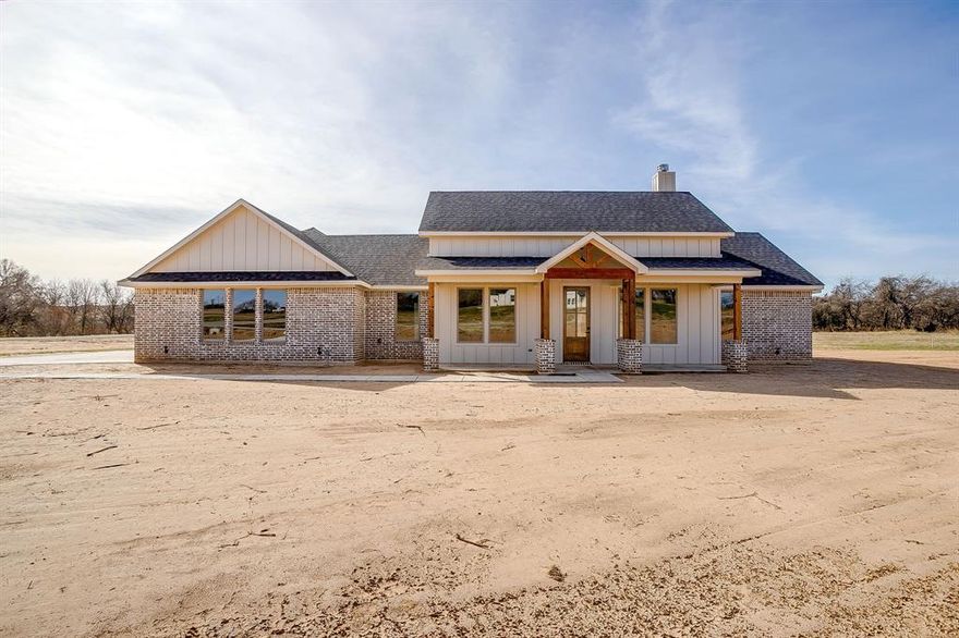 *** NEW PRICE *** OPEN HOUSE ~ March 15 from 1-3PM *** Step into the lifestyle you’ve been dreaming of with this stunning new modern farmhouse by Provincial Builders, one of the area’s most respected and sought-after custom home builders. Nestled on a peaceful, private two-acre treed lot, this home perfectly blends timeless country charm with the clean lines and conveniences of modern living. With approximately 2,250 square feet of thoughtfully designed space, every detail has been carefully considered to create a home that is as functional as it is beautiful. The inviting exterior features classic white siding, rich wood accents, and a side-entry two-car garage that enhances curb appeal while offering easy access. Inside, natural light fills an open and airy floor plan, where tall ceilings and wide views of the surrounding trees create a calm and connected feel throughout. At the heart of the home is the spacious kitchen, complete with a large island perfect for family meals, entertaining friends, or helping with homework. A deep farmhouse sink, custom cabinetry, and quality finishes add warmth and character, seamlessly connecting the kitchen to the dining and living areas - ideal for gatherings or relaxed evenings at home. The primary suite serves as a tranquil retreat, offering a generous walk-in closet and a spa-inspired ensuite bath. Two additional bedrooms provide versatile space for family, guests, or a home office, each thoughtfully positioned to capture natural light and serene views. Outside, the two-acre lot provides endless possibilities - from creating a garden or outdoor kitchen to adding a firepit or space for your animals. This property is horse-friendly and offers the freedom to enjoy country living while remaining just a short drive from town conveniences. It’s more than just a home - it’s a lifestyle, built just for you.