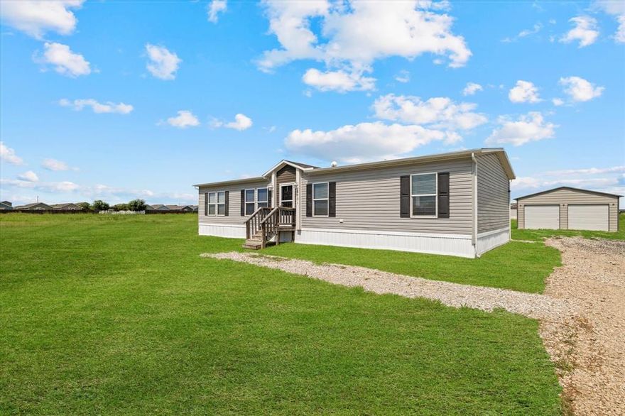Tucked away in a quiet cul-de-sac within the booming city limits of Princeton, this newly remodeled home sits on just over an acre with no HOA—offering the perfect blend of privacy, freedom, and accessibility. Featuring 3 bedrooms and 2 bathrooms, the layout is both functional and inviting, with a spacious master suite that includes a beautifully updated bathroom complete with a large soaker tub for ultimate relaxation. The kitchen is a standout, designed for both everyday living and entertaining. Outside, a 25x25 workshop with two roll-up doors provides plenty of room for tools, toys, or creative projects. Whether you’re commuting to Dallas, enjoying the lake just minutes away, or simply appreciating the peaceful setting, this home brings comfort and convenience together in one exceptional package.