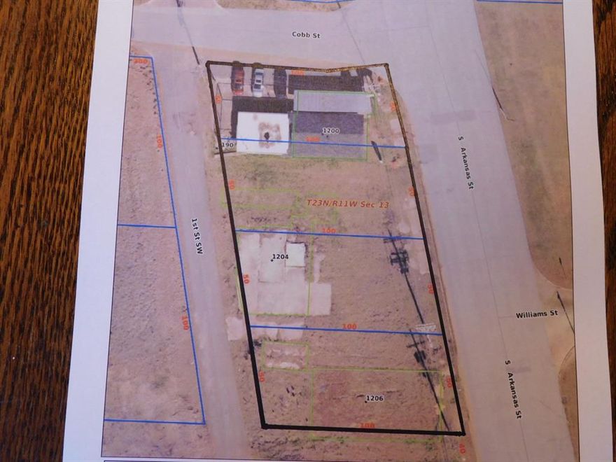 UNIQUE INVESTMENT OPPORTUNITY! THIS 0.46 ACRE COMMERCIAL TRACT FRONTS 200 FEET ON HEAVILY TRAVELED 4-LANE, S. ARKANSAS STREET (U.S. HWY 317) IN SPRINGHILL, LA. THIS PROPERTY INCLUDES ONE BUILDING WITH APPROXIMATELY 1,240 SQUARE FEET CURRENTLY LEASED TO A PAY DAY LOAN BUSINESS AND TWO OTHER PORTABLE BUILDINGS HOUSING A RESTAURANT AND A DRIVE THROUGH BEVERAGE BUSINESS. LEASES PROVIDE $2,200 GROSS INCOME PER MONTH. CALL LISTING BROKER FOR ADDITIONAL INFORMATION.