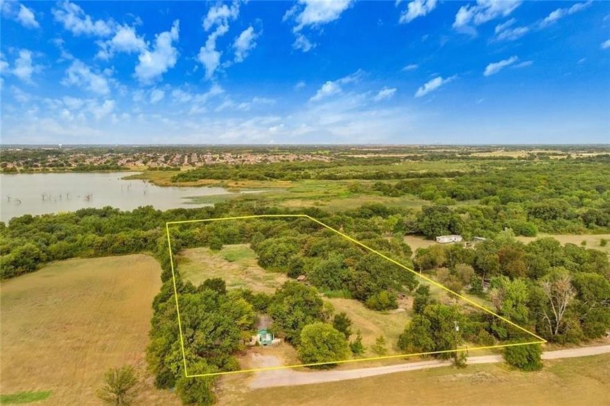ONE OF A KIND, beautiful, heavily treed lakefront property nestled away on Lake Ray Hubbard. A little over 2.5 acres, perfect to build your dream home and enjoy the never ending views! Two other adjoining properties available for purchase, Property to be sold at lot value, HOME AS-IS. No Survey-Buyer will need to purchase new one.