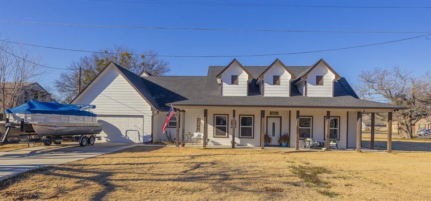 Enjoy lake living at its best with direct access to Lake Granbury from this stunning home built in 2021. Designed to feel like a private resort or vacation retreat, this home features wood-look tile throughout — no carpet anywhere.

The spacious open-concept family room flows seamlessly into the kitchen and is filled with natural light from large windows. A cozy fireplace anchors the space, offering plenty of room for friends and family to gather, relax, and unwind. A versatile bonus room provides the perfect space for game nights, entertaining, or holiday dinners.  Ample storage includes large closets and a generous pantry.

Whether you’re spending weekends at the lake or living here full-time, this home is built for enjoyment. Launch your kayak or pedal boat directly from your backyard, with a full-service marina just moments away. 

Evenings are best spent outdoors on the enlarged 17x14 covered patio, complete with a custom-built pergola — ideal for relaxing or hosting guests. The home also offers extensive attic storage, with potential to convert into additional living space.

Whether as a vacation getaway, weekend retreat, or primary residence, this is the home where memories are made.