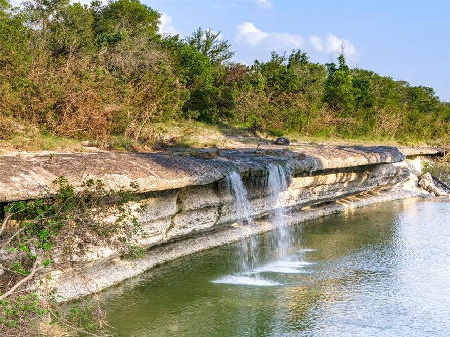 A lot to say here but limited to 300 characters.  Opportunity of a lifetime to own one of the most unique and breathtaking ranches in Central Texas. Legend has it one of Waco’s early prominent businessmen acquired this property and coined it with an iconic name—The Klondike.  He believed he had found the “Golden Nugget”. A ranch so rich in terrain, resources, Indian history, and recreational value, it lives up to its namesake.

Enjoying one mile of the North Bosque Riverfront, The Klondike stands out among the rest with a convenient location along the high side of the river, deep canyons, rocky outcroppings, towering hardwoods, seasonal springs and waterfalls.  We have isolated multiple potential building sites with stunning views and utilities are on site.

Located just 16 miles northwest of Downtown Waco, the ranch enjoys a mile of N. Bosque Riverfront with many potential build sites.  The location of the ranch is also compelling and convenient for Waco, DFW, and Austin residents.  See associated doc Texas Triangle.

There is an ATV road system that traverses the property.  You will see rocky outcroppings, elevated valley views, the river bottom, abundant wildlife, early Americian artifact dig sites, significant tree canopy, canyons, open pasture and more.   The river provides hours of exploration.

We believe the many attributes of this stunning river property render it a one-of-a-kind Central Texas ranch land investment.  The ranch enjoys a current Wildlife Exemption under 1-d-1 ag, which helps reduce annual taxes.  For the family looking for the perfect perch in which to build the house of their dreams, The Klondike is certain to punctuate the project.  Private quiet acreage, convenience, unparalleled views, one mile of river access, excellent hunting, exploration, and plentiful native American artifacts, combine to create a truly unique land acquisition opportunity.  You will not likely find a ranch listing this rare.