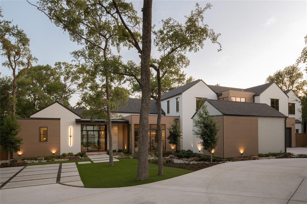 Rare opportunity to live on a .75 acre lot in Preston Hollow. Welcome to this exceptional brand new custom home crafted by New Leaf Custom Homes, where luxury meets tranquility on a sprawling .75-acre lot. This stunning residence boasts a generous backyard oasis complete with a sparkling pool and inviting spa, perfect for entertaining or unwinding in style. Featuring five spacious bedrooms and five full bathrooms, along with three convenient powder baths, this home is designed for both comfort and functionality. The primary suite is a true retreat, fit for royalty, offering serenity and elegance. Nestled against a picturesque creek and surrounded by lush, mature trees, this property offers a perfect blend of privacy and natural beauty that you'll be pressed to find elsewhere.