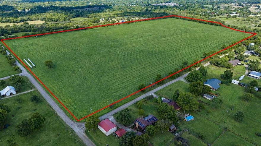 This expansive 48.74-acre property is a hidden gem on the edge of town, right next to the city limits. It's an exciting opportunity for those seeking a prime piece of real estate. The property boasts vast open cleared land, a canvas awaiting your vision. City sewer lines conveniently run just inside the thenorth edge of the propertyand Woodbine Water is at the road, making this property well-positioned for future development. Whether you're dreaming of a sprawling estate, a sustainable farming endeavor, or a new residential community, the possibilities are boundless. With its rural charm and proximity to urban conveniences, this property perfectly combines the best of both worlds. Imagine the serene country lifestyle you can create here while still enjoying easy access to city amenities. It's a unique chance to own a slice of tranquility on the outskirts of town. Don't miss out on making your real estate dreams a reality on this country-boy-approved land.