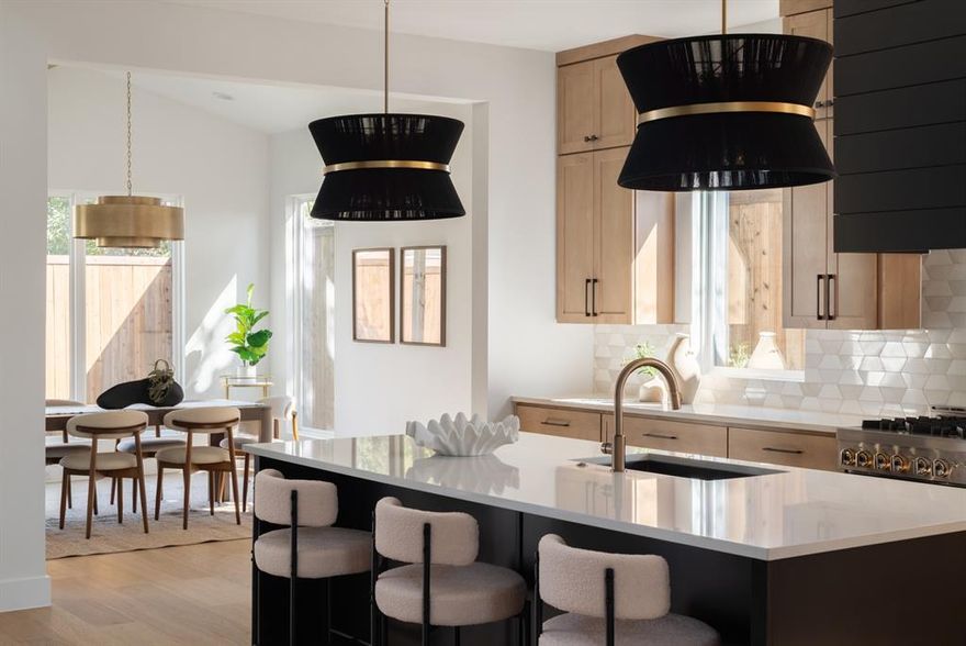 MLS# 21066827 - Built by Homebound - Ready Now! ~ Introducing The Mason - Homebound's latest floor plan in Dallas, located in the L-Streets! Wrapped in the Transitional Bold Deluxe design package, the Mason offers a chic and sophisticated aesthetic. This new construction home offers open concept kitchen featuring top of the line JennAir appliances and quartz counter tops.  The kitchen opens beautifully to the great room with gas fireplace and formal dining room.  Additional design features include a prep kitchen for added convenience, a covered patio for indoor-outdoor living, and a versatile flex room great for remote work or studying.  The spacious ensuite primary features spa like bathroom with a soaking tub and separate shower. Three additional bedrooms, and 3.5 baths complete the home. Rustic charm meets modern elegance with the Modern Farmhouse exterior with a steep roof, oversized windows, and a classic front porch.  It’s perfect for those who value light-filled, functional living. Includes 1-2-6 Builder Warranty and 3 year complimentary home automation. This home offers late stage personalization -  allowing buyers to select limited interior and exterior finishes.