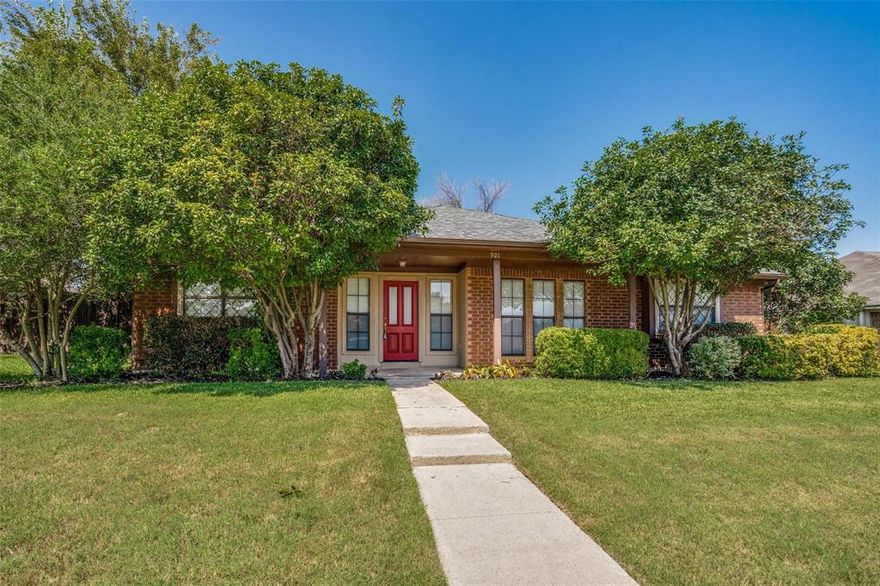 Prime Plano Location! This charming 1-story home is situated in a sought-after neighborhood and is move-in ready. Step into a spacious living area with vaulted ceiling and enjoy easy maintenance with NO carpet throughout the home. Brand new wood flooring in all bedrooms. The kitchen includes a new range cooktop, plenty of natural light, and the refrigerator stays! A spacious bonus storage room is conveniently located off the kitchen. Relax or entertain in the large backyard with a covered patio. Lawn and landscaping services are also included! Just minutes from Hwy 75, shopping, dining, and more. Don’t miss this turnkey gem!