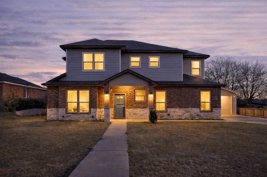 Custom family residence situated on an expansive lot featuring an open floor plan between the kitchen, living, and dining areas, providing an wonderful space for family gatherings and entertaining. The living room offers a view of the covered patio and backyard, complete with a cozy fireplace.  The master suite is spacious and contemporary, equipped with a separate enclosed shower, dual vanities, and a large walk-in closet. There is a guest bedroom located on the ground floor that connects to a full bathroom, making it an ideal space for a mother-in-law suite. The upstairs also includes a junior master bedroom with an adjoining bathroom, along with another bedroom and bathroom, for 3 full bathrooms on the upper level and 1 full bathroom on the ground floor (4 full bathrooms in total). An additional living room on the upper level could serve as a home office or an extra bedroom. The property features a 3-car garage in addition to a 2-car garage-workshop with a mini kitchen and bathroom. There is no homeowners association!