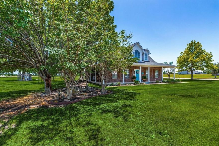 5 acres in Gunter.  HOA-no. MUD-no. PID-no.  Slice of heaven-YES! Finding a home with 5 acres, a second living unit, and storage is like finding a needle in a haystack.  Country living, but just minutes from shopping. Just a 5 min drive to Preston or 289.  The main house is 2,160 sq ft with 3 bedrooms, 2 full and one half bath, and an office or dining room. From coffee at sunrise to watching the game with friends to cooking out for gatherings on the large covered front and back porches will make this your Home Sweet Home.  There is a large unfinished room above the garage with a separate entrance, approximately 24x18.  The secondary unit is a complete living space with a 2-car carport.  This unit is 678 sq ft.  Great for extended family or can be used for income-producing.  The barn or workshop area with a large roll-up door has electric, water, and a toilet.  Backyard has a smaller fenced-in area for pets, and the remainder of the yard is open for so many options.  The fenced yard is pool-sized.   There is a small storage shed as well. Lot is 5 full acres.