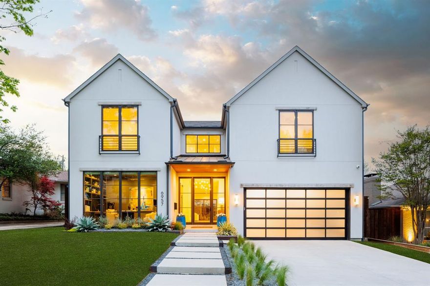 Built in 2021 by Montgomery Custom Homes, this stunning residence offers the pinnacle of modern luxury in one of Lakewood’s most sought-after locations. Just steps from White Rock Lake & Lakewood Park, this custom home boasts an exceptional floor plan with exquisite craftsmanship & thoughtful details throughout. The striking transitional architecture creates an inviting presence, enhanced by abundant natural light & remarkable design elements. Inside, you’ll find museum-finished walls, intricate millwork, luxurious tiles, & elegant white oak hardwoods. The heart of the home is the expansive family room, featuring a stunning center fireplace & a seamless connection to the outdoor living area through a breathtaking 20-foot sliding door. The chef’s kitchen is a masterpiece, equipped with a top-of-the-line Thermador appliance package & a dedicated working pantry—perfect for keeping countertops clutter-free. The dining room, framed by floor-to-ceiling windows & elegant white oak built-ins, provides an ideal setting for memorable gatherings. A stylish bar, complete with a wine refrigerator and ice maker, makes entertaining effortless. A spacious study offers both functionality & comfort with versatility to lounge or get work done. The private downstairs guest suite is tucked away through a vestibule, ensuring ultimate comfort. Upstairs, a generous game room serves as a central gathering space, complemented by oversized secondary bedrooms—each featuring private en-suite baths & walk-in closets. Enjoy the charming nook space conveniently located between the secondaries + a large storage closet. The primary suite is a true retreat, offering a spa-inspired bath and an enviable walk-in closet.  Incredible backyard is designed for outdoor living at its finest. Enjoy a fully equipped kitchen, an Isokern fireplace, and a large turf yard—ideal for play or relaxation.  Every detail of this home has been meticulously curated to offer the ultimate in luxury, functionality, and style!