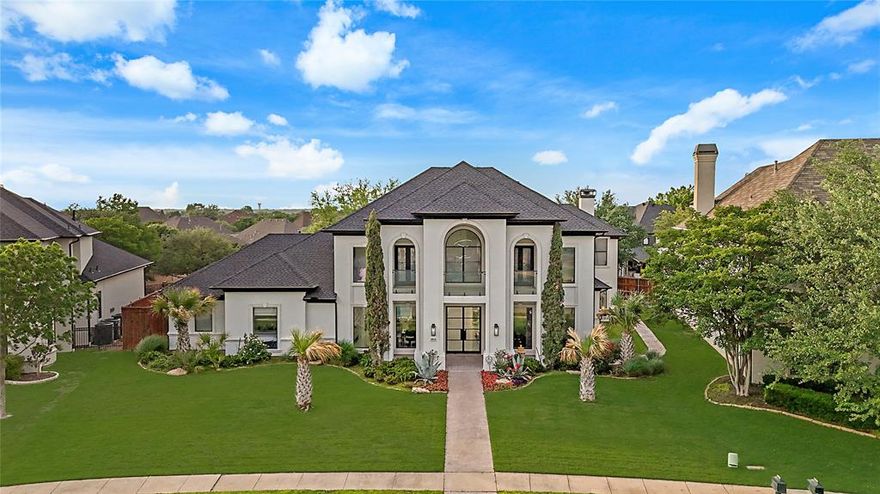 4824 Longvue Drive – The Pinnacle of Luxury Living. Where elegance meets comfort in this stunning estate, nestled within the prestigious gated community of The Lakes on Legacy. Situated on over half an acre of meticulously landscaped grounds, this home offers an unparalleled lifestyle defined by space, style, and sophistication. Step through the grand foyer with soaring ceilings and take in the view of the lush backyard oasis beyond. Every inch of this home has been thoughtfully updated with top-of-the-line finishes, blending timeless design with modern luxury. The expansive primary suite is a true retreat, featuring a spa-inspired en-suite bath complete with an elevated soaking tub, oversized shower, and premium fixtures. The chef’s kitchen is a culinary dream, outfitted with high-end appliances, custom cabinetry, and an open layout that flows seamlessly into a secondary living space and bar—perfect for entertaining. Massive sliding glass doors open up to a resort-style backyard, where you’ll find a sparkling swimming pool with integrated spa, a covered lounge area for alfresco dining, and even a private basketball court for recreation. Located in a prime area close to top schools, shopping, and dining, 4824 Longvue Drive offers the rare opportunity to own a home that truly has it all.