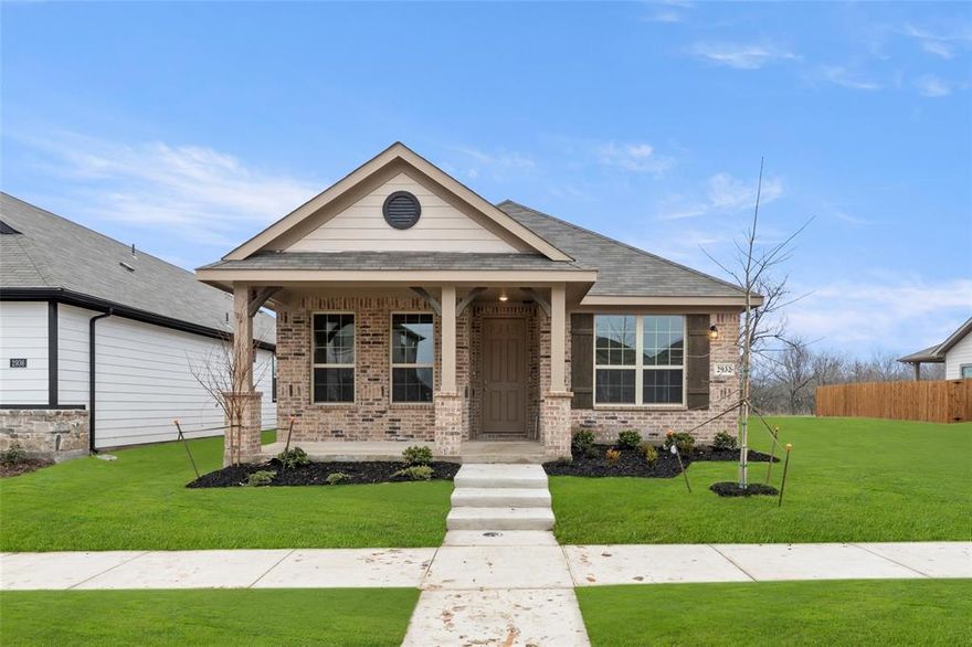 MLS# 20466008 - Built by HistoryMaker Homes - Ready Now! ~ Do not miss this incredible opportunity to own your dream home with modern amenities and a cozy, spacious design.  The wood-look ceramic tile throughout the main living area adds a touch of elegance.  The primary suite offers a walk in closet, a 5 foot ceramic tile surround shower, and a 90 inch vanity with a knee space for a stool.  Beautiful Dakota Maple white painted cabinets throughout the home.  The kitchen has 42 inch uppers and the countertop is a lovely granite.  The island includes an undermount sink, single handle faucet with sprayer, and a push button garbage disposal.  The upgraded appliance package includes Whirlpool dishwasher, gas range, and a microwave vented to the outside.  The entry to the home feels grand with an 8 foot front door and adorable covered front porch.  Never run out of hot water with a Rheem tankless water heater..