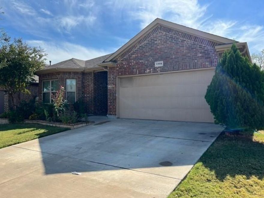 Classic brick and wood trimmed 3 bedroom 2 bath house with ceramic tile and carpeted floors, designer lighting, garden tub and shower in master bedroom and walk in closet, mini blinds throughout, wood fenced back yard, patio and entrance enclosed, central air conditioning and heating, gas stove, and refrigerator, microwave, disposer and dishwasher and 2 car garage.