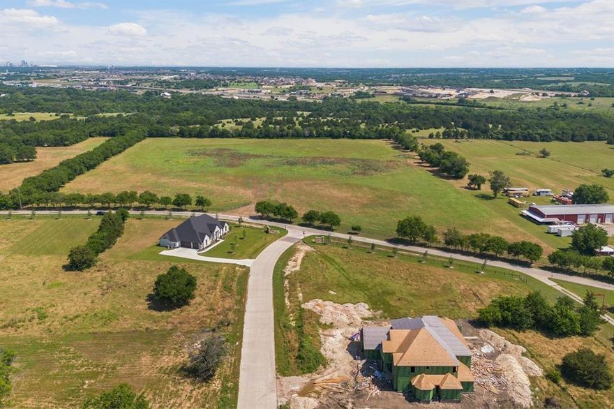 Uncover a rare opportunity to own 19.16 acres of undeveloped land in the heart of Midlothian, TX—perfectly suited for your dream estate, small development, or future investment.

Located at 4611 Stout Road, this expansive property sits within Midlothian city limits and is zoned for residential-agricultural use, offering an ideal blend of open space and accessibility. The land features gently rolling topography, lush pastureland, and mature trees, providing both scenic beauty and multiple build sites.

Situated near established subdivisions with luxurious custom-built homes—but with no HOA restrictions or fees—this property gives you the freedom to create your vision without compromise.

With paved road frontage, water and electricity available, this location combines the tranquility of rural living with the convenience of being minutes from major highways, schools, shopping, and dining.

Whether you're building a custom home, creating a multi-generational retreat, or exploring development potential, this property offers unmatched versatility in a high-growth area.

Come experience the potential of this exceptional land—schedule your private tour today!