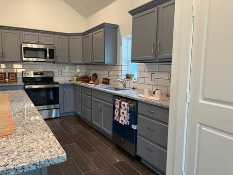 Photo of 3830 MCDOUGAL Street, Greenville, TX 75401 (MLS # 21150400)