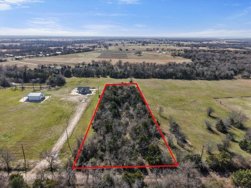 Explore the possibilities of this 1 MOL acre tract in Point, TX. The property features mature trees that provide natural privacy and a scenic setting.
Located just minutes from Lake Tawakoni, you’ll enjoy convenient access to fishing, boating, and outdoor recreation while still benefiting from small-town charm. With easy access to major roadways for commuting, this property combines country surroundings with everyday convenience.