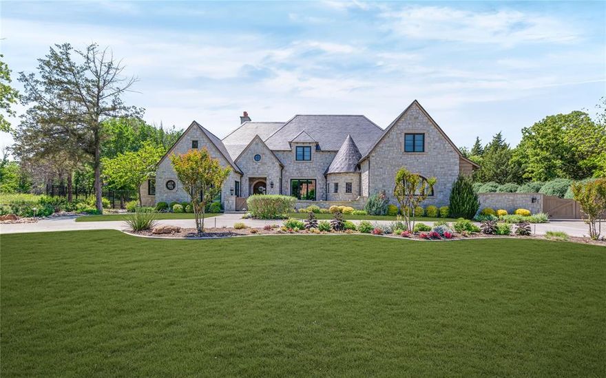 Welcome to 1520 Moss Lane, a stunning custom estate in the gated community of Moss Farms in Southlake. Set on over an acre in Carroll ISD, this 5,746 sq ft home offers timeless design, luxury finishes, and thoughtful functionality throughout.

The home features four spacious ensuite bedrooms with walk-in closets, four full baths, and two powder baths. The primary suite is a serene retreat with a private sitting area, spa-inspired bath with dual vanities, dual water closets, walk-in shower with body sprays, and a custom closet with direct access to the laundry room.

Elegant limestone tile flooring runs through the main living areas. The family room boasts real cypress wood ceilings and a full masonry fireplace with a marble mantle. The chef’s kitchen is equipped with two oversized islands, quartzite countertops, commercial-grade appliances, real cypress wood beams, and two pantries. A formal dining room with butler’s pantry and a bright breakfast room complete the space.

A dedicated office, additional workspace in the laundry room, and a game and theater room with full bar offer ideal spaces for work and play. Smart home features, electric shades, built-in speakers, and designer lighting enhance everyday living.

Enjoy year-round outdoor entertaining with a covered patio, fireplace, electric screens, built-in grill, and a pizza oven. The oversized jacuzzi and tranquil water feature complete the backyard oasis. Adjacent to a heavily wooded greenbelt, the property offers privacy and natural beauty.

Additional highlights include a four-car garage, full-house generator, and a fully encapsulated ~1,750 sq ft walk-up attic ready to be finished. This home is a rare opportunity to own a true luxury estate in one of Southlake’s most sought-after communities.