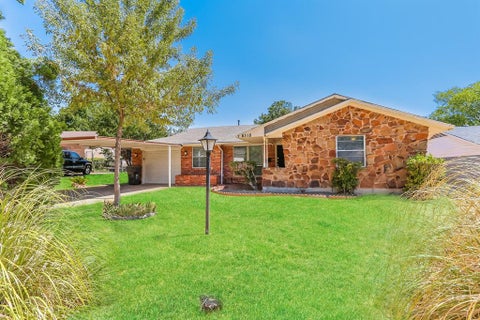 Photo of 6318 Songwood Drive, Dallas, TX 75241 (MLS # 21402641)
