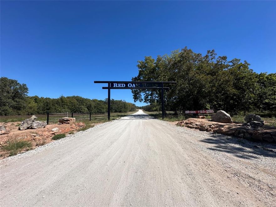 Gorgeous Acreage community to get away from the woes of the world and build your own private haven. Electricity is on site and the property can be AG exempt. This 5 acre lot is rectangular shaped with approximately 259ft of frontage and goes back approximately 807 ft. With lots of tree and sits up from the roads elevation. Great spot for a wonderful new home! Electricity is being put in currently and the roads will be paved after electricity is completed. Get in Early!