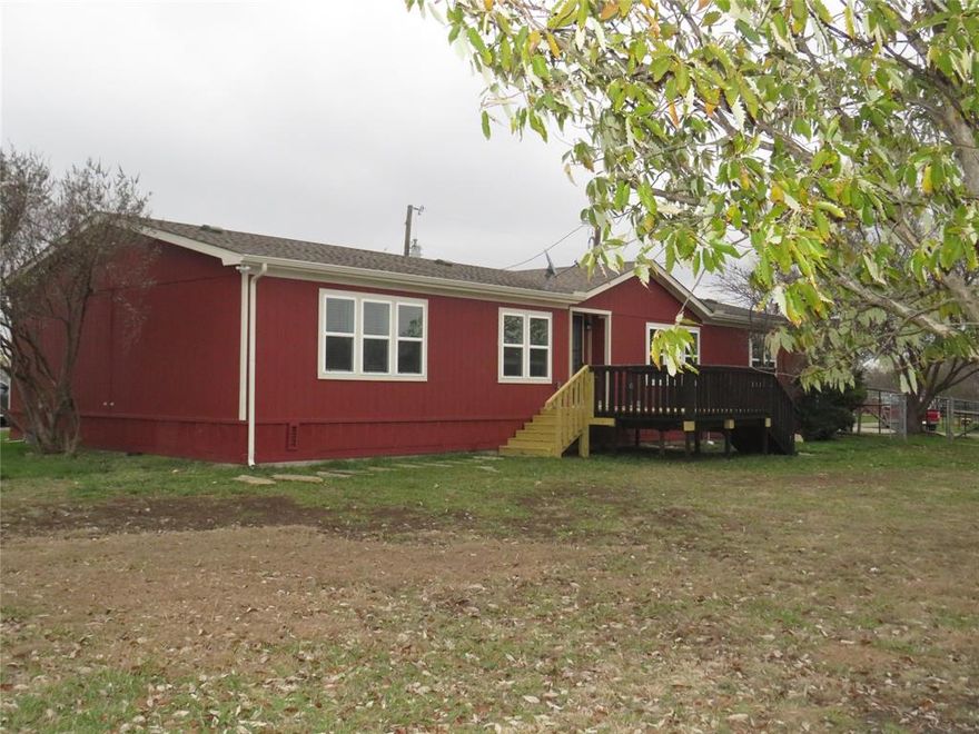Discover peaceful country living in this beautifully updated 3-bedroom, 2-bathroom mobile home located at 2151 Crockett St, Sanger, TX 76266. Offering 2,016 sq ft of spacious living, this home features an open-concept layout with a large living area, abundant natural light, and a freshly painted interior. The home also includes brand-new vinyl flooring and new carpet for a modern and comfortable feel throughout.

At the front entry, you’ll find an additional bonus room, perfect for a home office, study, playroom, or extra living space to fit your needs. The kitchen offers generous cabinet storage, a center island, and open sight lines to the living and dining areas—ideal for everyday living and entertaining.

The mobile home sits on a 4-acre property, with 1 acre exclusively available to the tenant, providing the perfect amount of outdoor space. The property does have a fence.

Additional features include a spacious primary suite with a private bath, well-sized secondary bedrooms, laundry connections, and a welcoming front deck—perfect for relaxing outdoors. Located just minutes from I-35, shopping, and dining, this home combines comfort, convenience, and country charm.