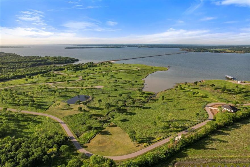 Magnificent lot, measuring just over an acre, in one of the premiere waterfront subdivisions at Richland Chambers. A short 1 hour drive from downtown Dallas is an easy escape from the concrete jungle to enjoy your lakeside oasis. You can almost feel the stress melt away once you cross the FM 2859 bridge as you approach your own slice of heaven on earth. Your future home site is within walking distance to the community pool and boat ramp. The Chambers Bay subdivision building restrictions require a site built home, with a minimum of 1,600 sq ft.
