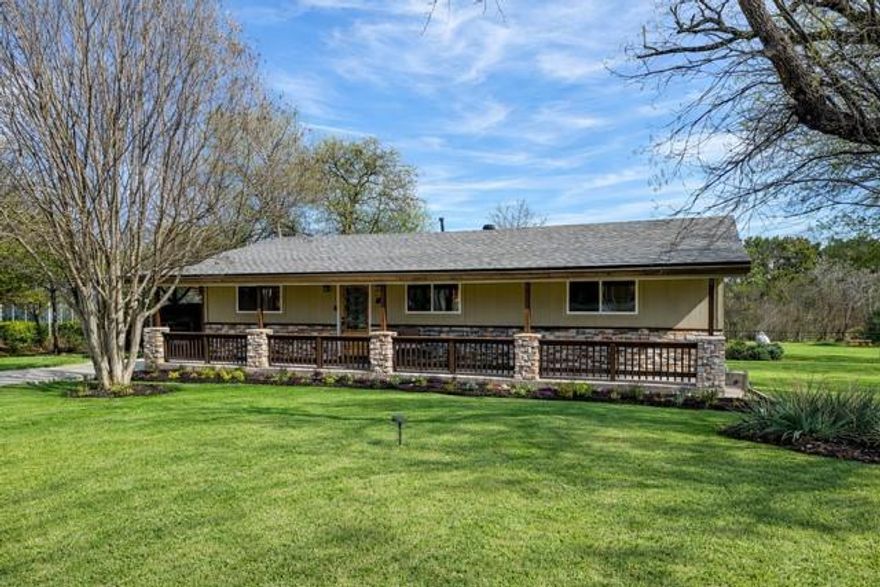 You cannot miss this amazing completely remodeled home in Lake Whitney area. 6-minute walk to the water and a few blocks away from the boat docks to access Cedar creek that flows lo Lake Whitney. This beautiful 3 Bedroom 2 Bathroom home, remodeled and updated in 2024. In 2004 this house had new Sheet rock, new insulation. new electrical, new floors, new cabinets, new bathroom features, new 560 gal aerobic septic system. No back yard neighbors enjoy the view of beautiful green trees and many different type birds and wildlife. Front porch has a welcoming covered patio with a stone veneer that adds the perfect touch of charm to this home. 20 x13 Cedar support covered carport and 8X 10 storage unit for vehicles and lawn equipment. HVAC is a new unit and the home is equipped with a 14 KW ATS Kohler gas operated generator that runs the home in case of electric outage or live of the grid. This remodel has thought of everything, The entire house connected to Express Water filtration system, Laundry room tiled flooring with grey water drainage (to septic) in case of accidental leakage (Hot water heater and washing machine). Preventing spillage into home. Owners thought of it all ! But WAIT - Wait until you see the master bathroom shower tub combo ! Time to sit back and relax ! Master bath is located off a very spacious Master bedroom with a large closet. On the opposite side of the home you will find two bedrooms, a guest bathroom. Open concept living room, kitchen and dining combo ! Lots of natural light, upgraded pine doors, new windows.