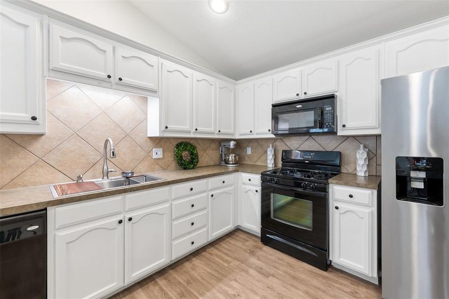 You will love this darling one-story, 3-bedroom, 2-bath home, offering thoughtfully designed living spaces and the added benefit of no carpet. The kitchen is a dream for any cook, featuring a recently installed commercial-style sink with a high-quality glass rinser. There is ample cabinet and counter space, a gas range, walk-in pantry, and breakfast bar. As a bonus, the refrigerator is included with the property. 
The spacious dining area is filled with natural light and looks into the living room, which features a cozy gas fireplace. 
The primary suite is both spacious and private, complete with a walk-in closet. The ensuite bath includes a linen closet and medicine cabinet for extra storage. Two additional bedrooms and a full bath provide comfortable accommodations for family or guests. 
The large and private back patio is ideal for relaxing or entertaining. 
Recent upgrades include new water heater and toilets, ensuring modern convenience and comfort.
Residents of The Villages of Woodland Springs have access to excellent amenities, including a community pool, clubhouse, playground, park, walking trails, and catch-and-release fishing. The neighborhood offers convenient proximity to schools, shopping, dining, and major roadways, making it an ideal location for comfortable living. 
All information presented is deemed reliable but not guaranteed. Buyer and or Buyer Agent should verify all details, including features, schools, measurements, and taxes. Sellers and sellers agent are not responsible for discrepancies. Property is located in Tarrant County, TX Groundwater Conservation District 86.