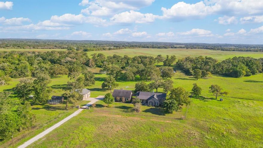 WOW WHAT A PLACE!!!! If you are searching for a larger tract of land and meticulously maintained CUSTOM home in FRANKLIN ISD, STOP WHAT YOU ARE DOING and book an appointment now. THIS 184 acre property has it all with improved PASTURES, cross fencing with a pond in each pasture, working pens with shed covering chute area, ample WOODS for HUNTING and privacy, chicken coup and nice insulated dog kennel with runs. The 3 bedroom 2.5 bath 2500sf home is well thought-out and offers many custom touches, LARGE 2 car detached garage with office and 1000 sf guest suite or game room with a full bath and kitchenette, LARGE shop with hydraulic lift, 3 large roll up doors for easy access, awning for equipment, and an additional fully enclosed RV cover all over looking the AMAZING SPRING FED POND and CREEK! The land is so functional and offers sandy loam soils, wildlife, privacy and ample room to run cattle. Seller is offering this as a whole 184 acres or with less acreage if needed.