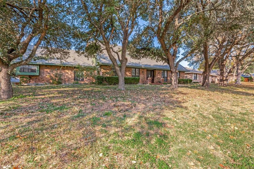 THIS IS A FABULOUS DEAL ON A VERY SPACIOUS 6 or even 7 BEDROOM HOME IN GREENWAY ESTATES, ONE OF THE MOST DESIRABLE, CONVENIENTLY LOCATED AREAS OF DUNCANVILLE!  REGALLY SITUATED ON AN ELEVATED WOODED LOT FACING EAST, THIS HOME FEATURES SPACE AND COMFORT FOR EVERYONE! The owner's suite has ensuite bath, with separate shower & double vanity. There are 2 other bedrooms downstairs, along with the family room, formal dining, kitchen, breakfast and 2nd living area or playroom. Upstairs features 3 additional bedrooms plus bonus media room or 7th bedroom! See-through fireplace between the family room and formal dining, rear entry garage. Won't last long at this price point, be in by Christmas!