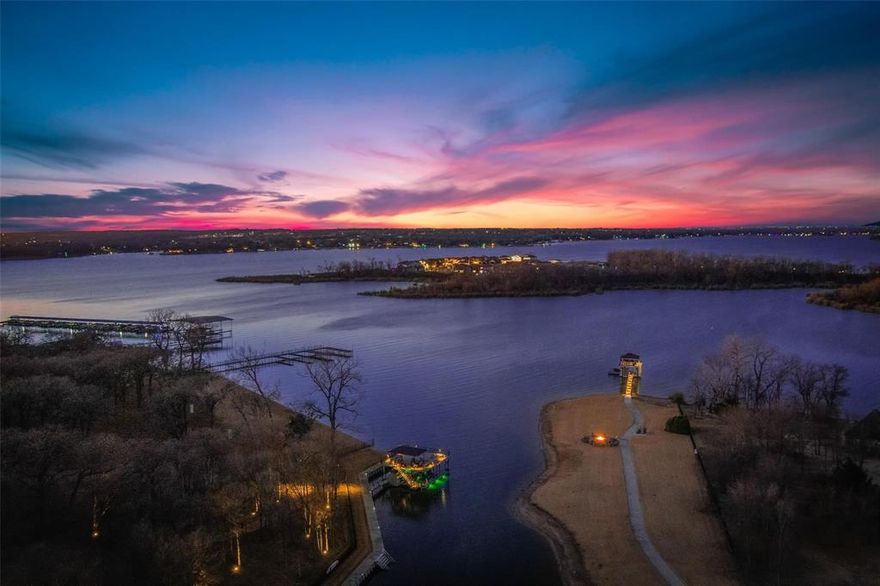 Lakefront Luxury Retreat on Eagle Mountain Lake. Experience the ultimate in lakeside living on this stunning 3.74 acre estate, located in an exclusive gated community just minutes from downtown Fort Worth. Boasting 650 feet of pristine water frontage on Eagle Mountain Lake, this exceptional property combines elegance, comfort, and resort-style amenities.
This custom crafted residence features 6 spacious bedrooms, 4 luxurious bathrooms, a dedicated office, and a flowing open concept living and kitchen area designed for entertaining. The gourmet kitchen is a chef’s dream, complete with granite countertops, a built in commercial refrigerator, double ovens, gas cooktop, oversized island, breakfast bar, expansive walk-in pantry, and a convenient butler’s pantry.
Thoughtfully appointed throughout, the home showcases hand-scraped wood floors, plantation shutters, custom chandeliers, and remote-controlled window shades. A mud bench area, large laundry room with built-in cabinetry, sink, and space for a second refrigerator provide everyday practicality. Upstairs, guest quarters with kitchenette and private balcony access offer the perfect retreat.
Step outside to your personal paradise: a covered patio with outdoor fireplace and misting system, built-in grill, fire pit, putting green, and a concrete walking, golf cart path from house leading to the water. The two-level dock features two jet ski ramps, tanning deck, and a boathouse equipped with a grill, sink, full-size refrigerator, water heater, and misters ideal for lakeside entertaining.
Additional features include a three-car garage, and is fully irrigated using lake water via a pump fed sprinkler system.
This is more than a home, it’s a lifestyle. Luxury, privacy, and recreation await at this one-of-a-kind Eagle Mountain Lake estate.