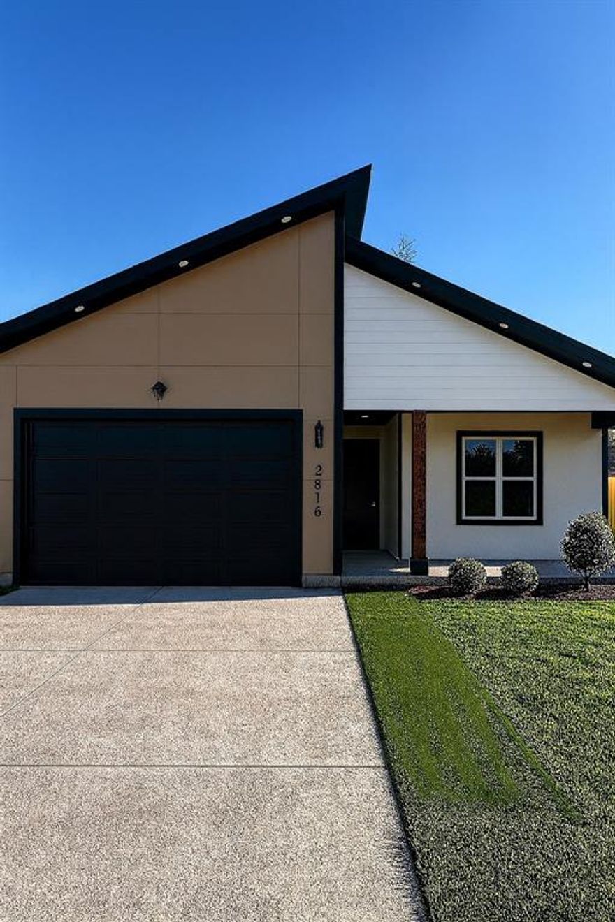 Up to $20,000 in seller and preferred lender incentives available for qualified buyers on this brand-new 4-bedroom, 2-bath home featuring an open floorplan, covered outdoor spaces, and plenty of storage throughout. This home offers an open layout with good natural light throughout the main living areas. The living room features an electric fireplace that adds a modern focal point without added maintenance. The kitchen opens to the living and dining areas and provides ample cabinet and counter space for everyday use. A large island anchors the space and is finished with quartz countertops, which continue throughout the home for a clean, cohesive look. The primary bedroom is set apart from the other bedrooms, offering added privacy. The primary bathroom includes a standalone soaking tub, separate walk-in shower, double vanity, and a spacious walk-in closet.
The laundry room includes a mud-style storage area, creating a practical drop zone for shoes, bags, and daily items. A covered front porch offers a welcoming entry, while the covered back patio extends the living space outdoors for everyday use.
Located minutes from Fair Park, Downtown Dallas, Deep Ellum, and major highways, with convenient access to dining, events, and other city amenities.

Seller and preferred lender incentives are available for qualified buyers. Up to $20,000 in combined down payment and closing cost assistance may be available when using the preferred lender, subject to lender approval and qualification.

This move-in-ready, brand-new home offers practical features, modern finishes, and convenient city access.