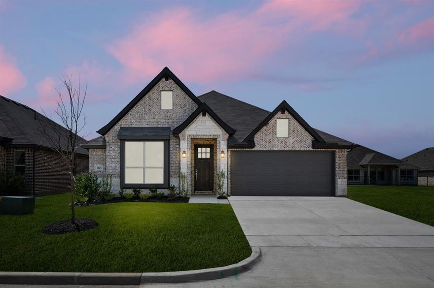 MLS# 21177392 - Built by Risewell Homes - Mar 2026 completion! ~ This thoughtfully designed single-story home offers a spacious and family-friendly layout with distinct areas for gathering and relaxation. The open family room anchors the home and flows seamlessly into the kitchen and breakfast nook, creating a bright central living space ideal for entertaining or everyday living. The private owner’s suite is tucked away for added privacy and features a generous walk-in closet and a well-appointed en-suite bath with dual vanities, a soaking tub, and a separate shower. Two additional bedrooms are grouped along the opposite side of the home with convenient access to a full bath, while a functional utility room and extended foyer enhance daily convenience. Just off the secondary bedrooms, a dedicated kids’ retreat provides flexible space, perfect for a playroom, homework zone, or teen lounge. A welcoming front porch and a two-car garage complete this well-balanced home, perfectly suited for comfortable living in Granbury.