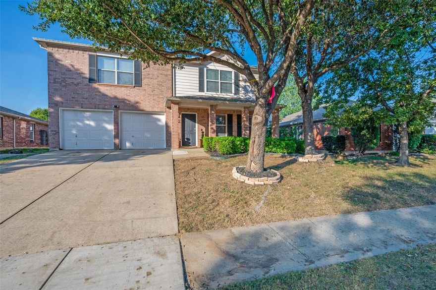 Immaculate and move-in ready, this beautifully updated 4-bedroom, 3-bath home in Chisholm Ridge blends modern upgrades with everyday comfort. Inside, premium wood-look tile flooring flows throughout with no carpet anywhere, complemented by new lighting, fans, and fixtures. The fully remodeled kitchen impresses with quartz countertops, stainless steel appliances, new cabinetry, and an oversized island perfect for meal prep and gatherings. The open-concept layout connects the kitchen, dining area, and spacious living room anchored by a cozy fireplace. The primary suite on the main level offers a renovated ensuite bath with dual vanities and a walk-in closet. Upstairs features three bedrooms plus a flexible loft and bonus room ideal for a media room, playroom, or home office. Outside, enjoy a private backyard with a covered patio and freshly painted exterior. Just a short walk from one of two community pools and minutes to I-35W and 287 for easy commuting, this home delivers space, style, and convenience in one perfect package.